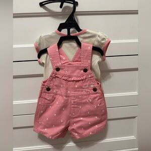 Bundle of 2 babygirl Carhartt items.